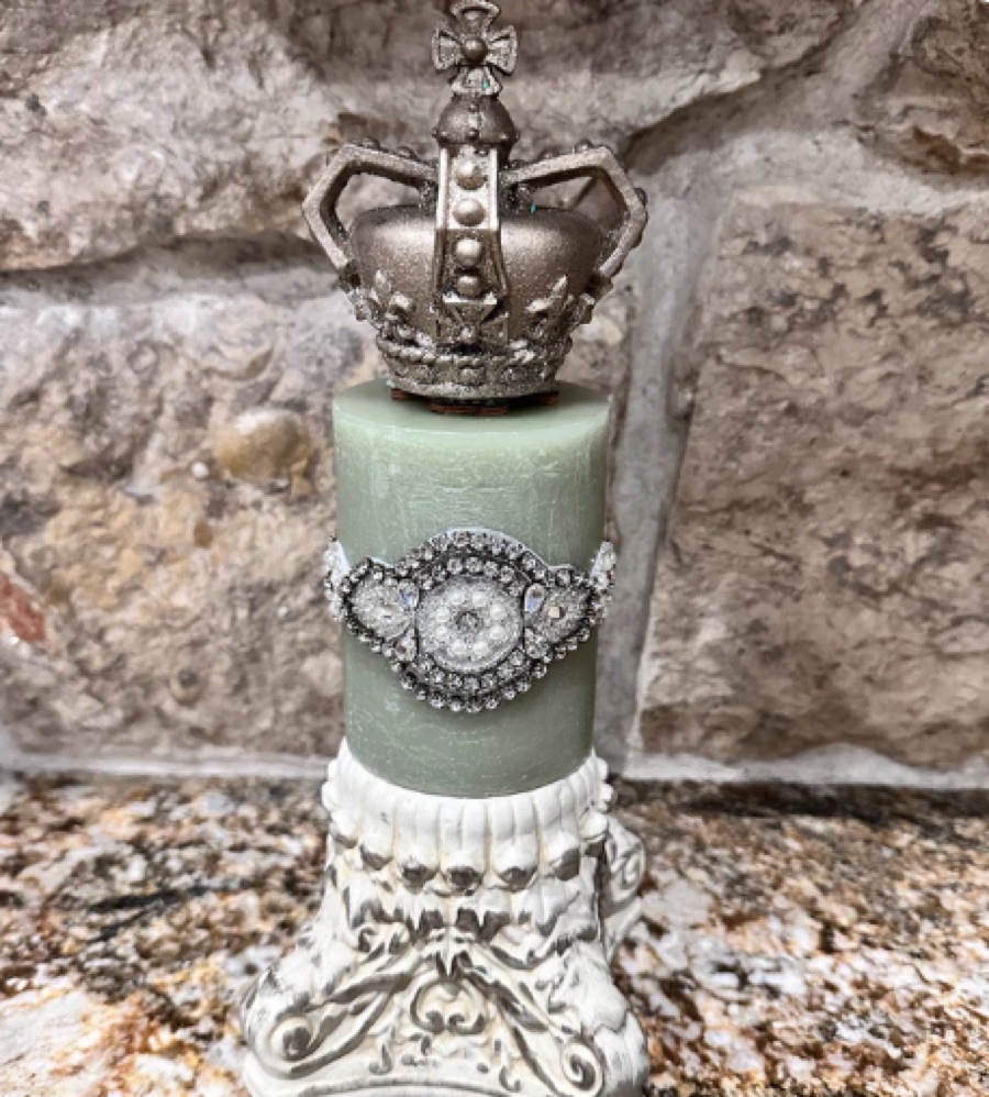 Sage candle finished with a silver crown topper and jeweled band