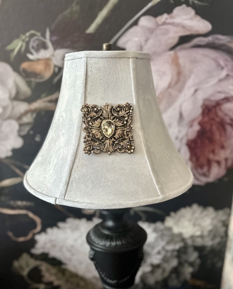 Linen lampshade with hand-applied jeweled medallion