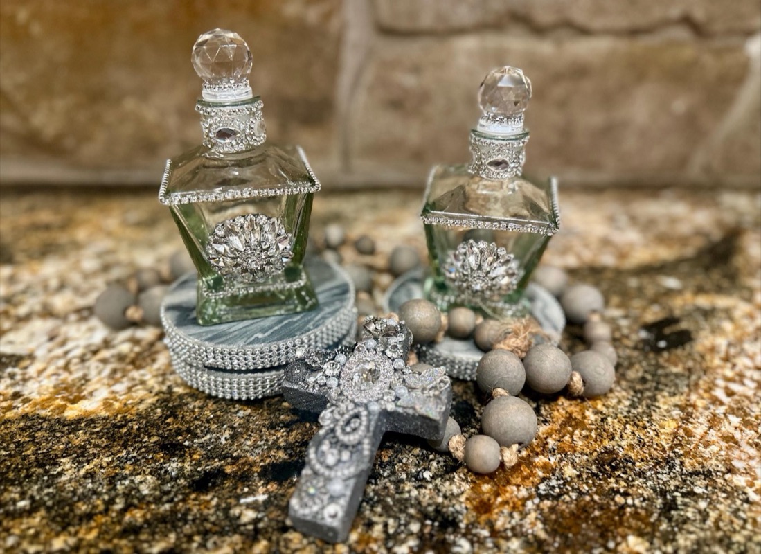 Crystal-trimmed decorative glass bottles