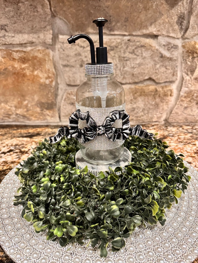 Hand-embellished bow dispenser detail